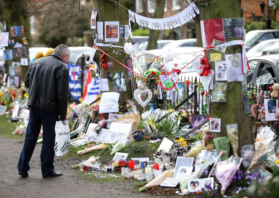  Thousands of tributes were left outside the singer's London home following his death