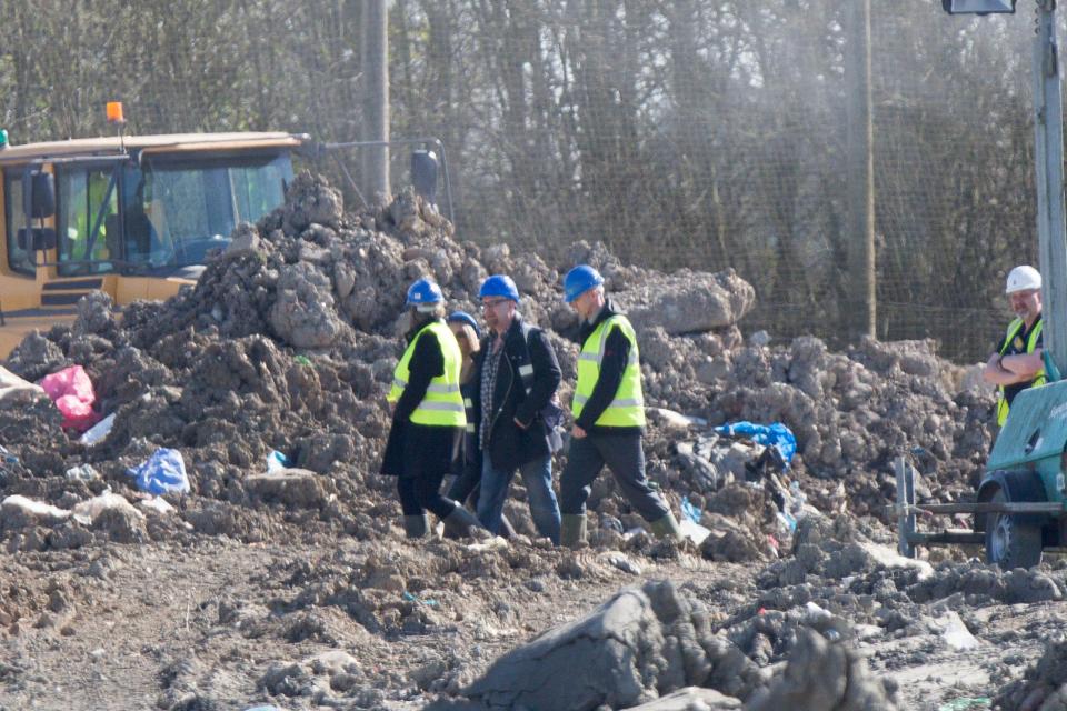  Martin McKeague, (centre in dark jacket) has made a second emotional visit to Cambridge landfill site in search of son's body