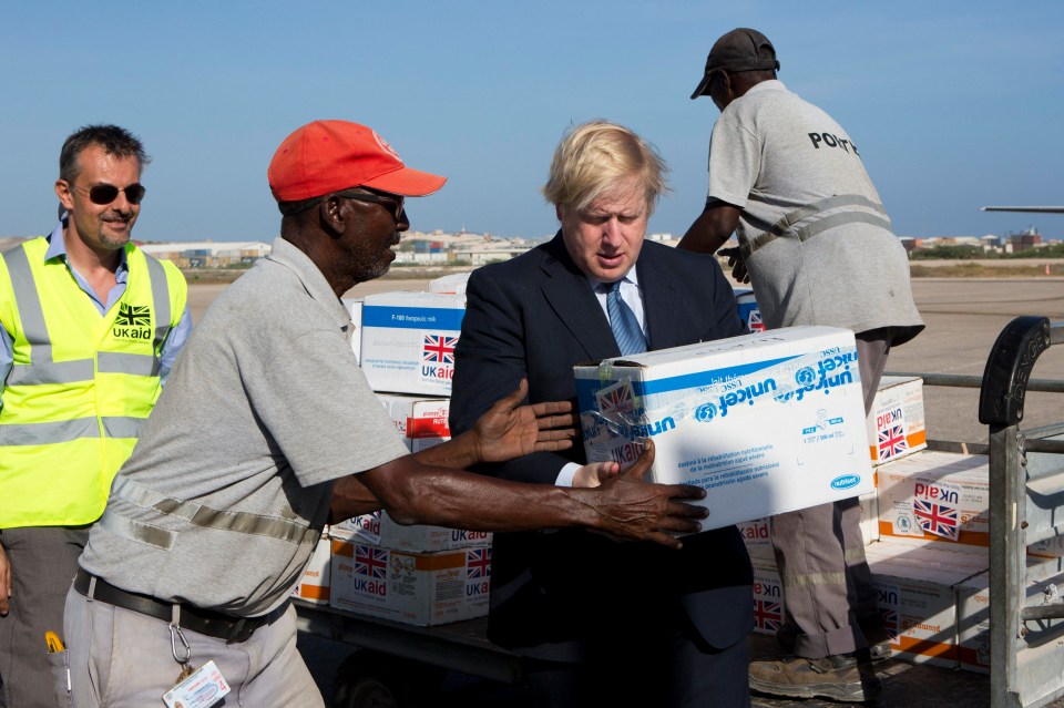 Boris Johnson helping to load supplies for treating malnourished children affected by the severe drought