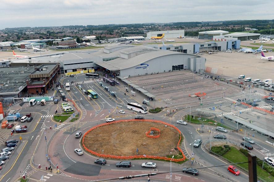  Luton baggage handlers were shamed last year for hurling bags around