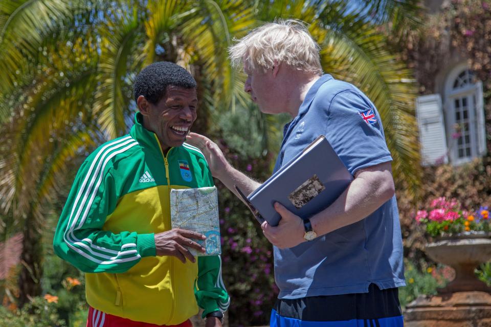  The pair consoled eachother on their joint effort at the end of the run, with Haile looking rather less worse for wear than the Foreign Secretary