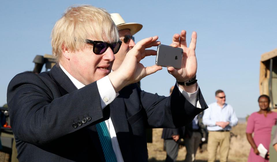  Snap happy... Boris Johnson takes photos on his trip to East Africa