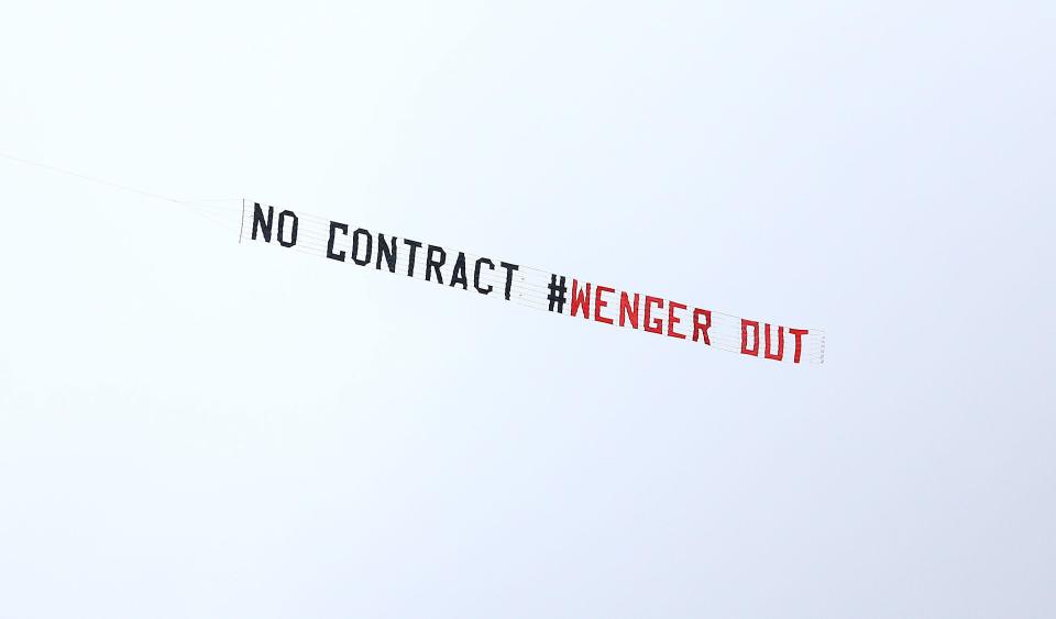 Fans flew a Wenger Out banner over The Hawthorns earlier this season