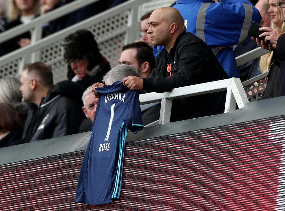 A Middlesbrough fan holds up an Aitor Karanka shirt ahead of the Manchester United clash