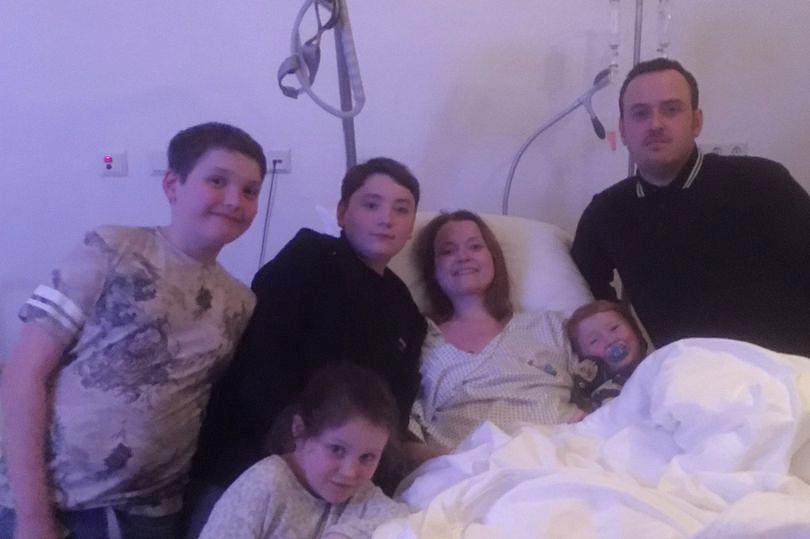  Cancer sufferer Sally with her husband Liam and their four children George Maisy, Adam and Ryan