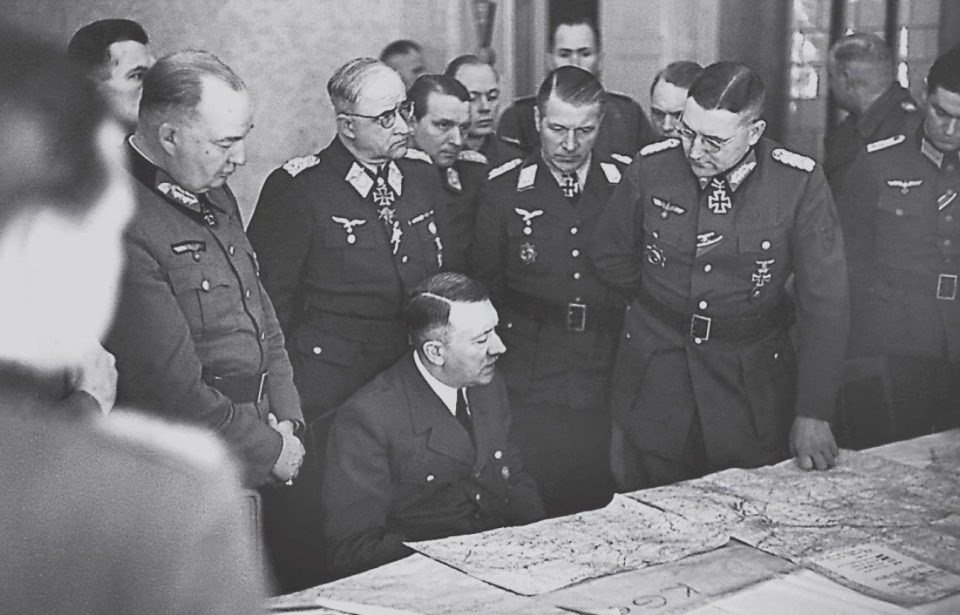  They also reveal the meetings of Hitler with his generals. He is seen here in a meeting following his final visit to German troops in March 1945