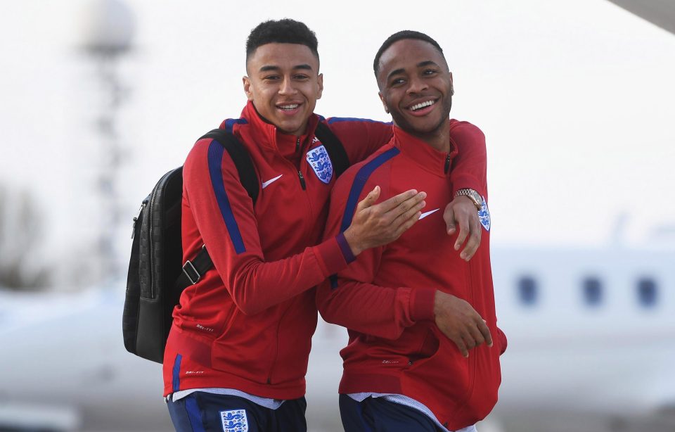 Jesse Lingard and Raheem Sterling looked to be having fun as England boarded their flight to Germany