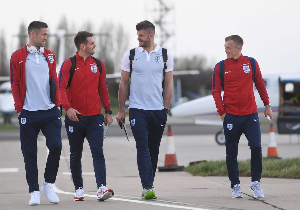 Gary Cahill, Tom Heaton, Fraser Forster and James Ward-Prowse at Birmingham Airport as England leave for Germany