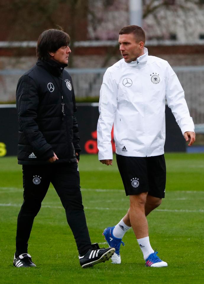 Joachim Low with Lukas Podolski, who will play his last game for Germany tomorrow