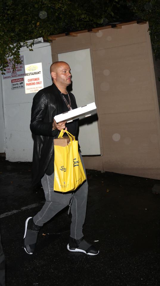  Stephen Belafonte was pictured grabbing pizza