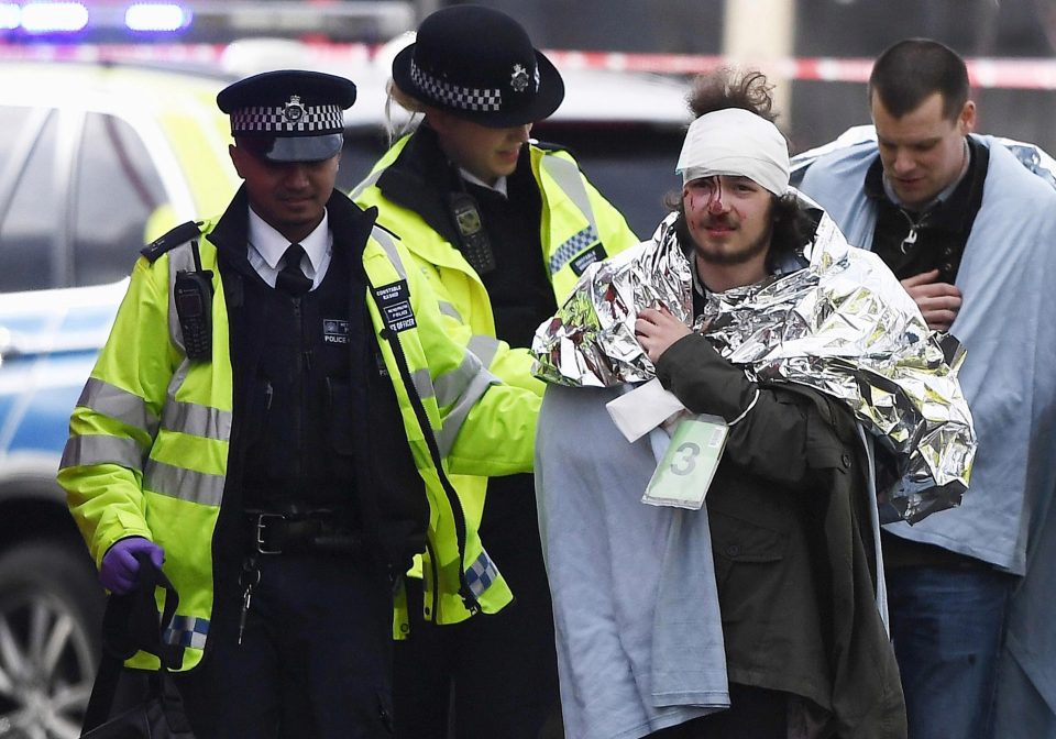  A man is treated by paramedics at the scene