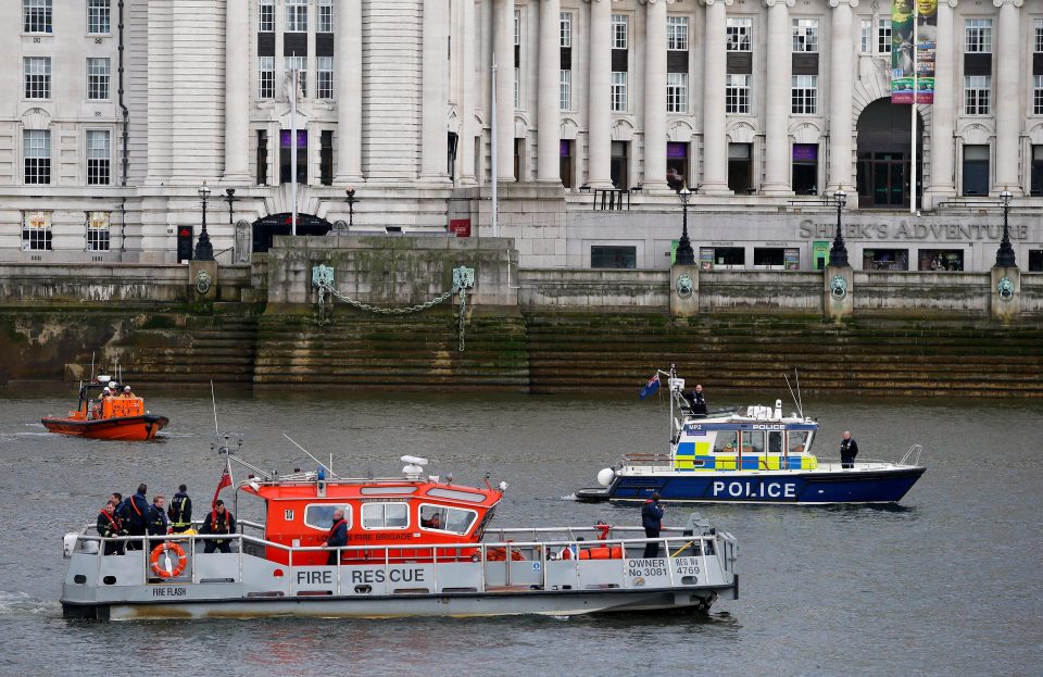  Police boats scan the river amid reports of victims being flung, or jumping, into the water