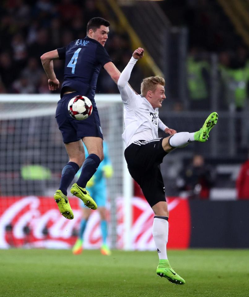 Keane challenges for the ball in a solid start for England