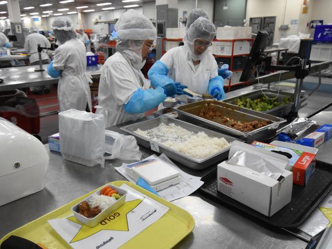 Food is prepared for the meals on Singapore Airlines 