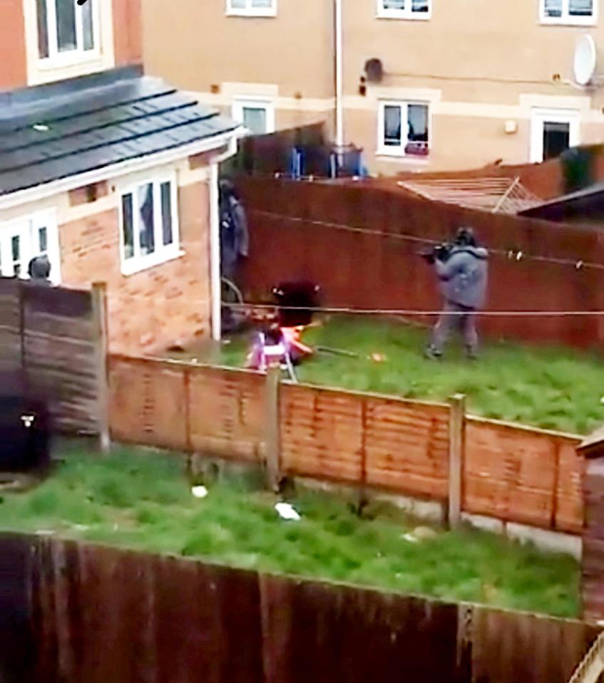  Police search the garden of a property on Navigation Way in Hockley, Birmingham, after further arrests were made in connection with the Westminster attack