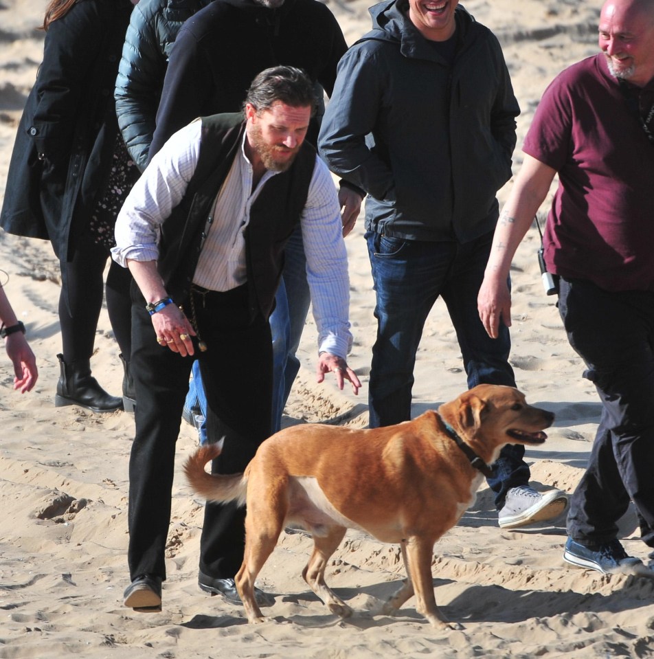 His playful dog Woody was spotted on set