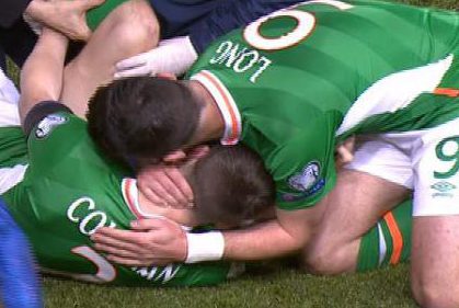 Shane Long rushed to Seamus Coleman's side to shield his eyes from his limb