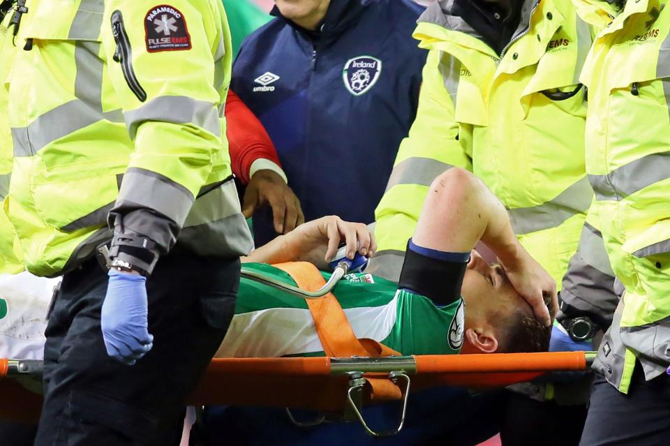  The brave defender was carried off on a stretcher with paramedics tending to him