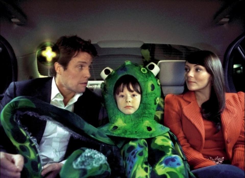  Billy, dressed as an octopus, sits between Hugh Grant and Martine McCutcheon