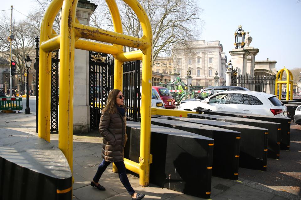  One of the metal yellow cages installed near Buckingham Palace at the weekend