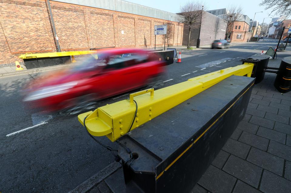  Menacing steel barriers have been put up on roads leading to the Queen's residence