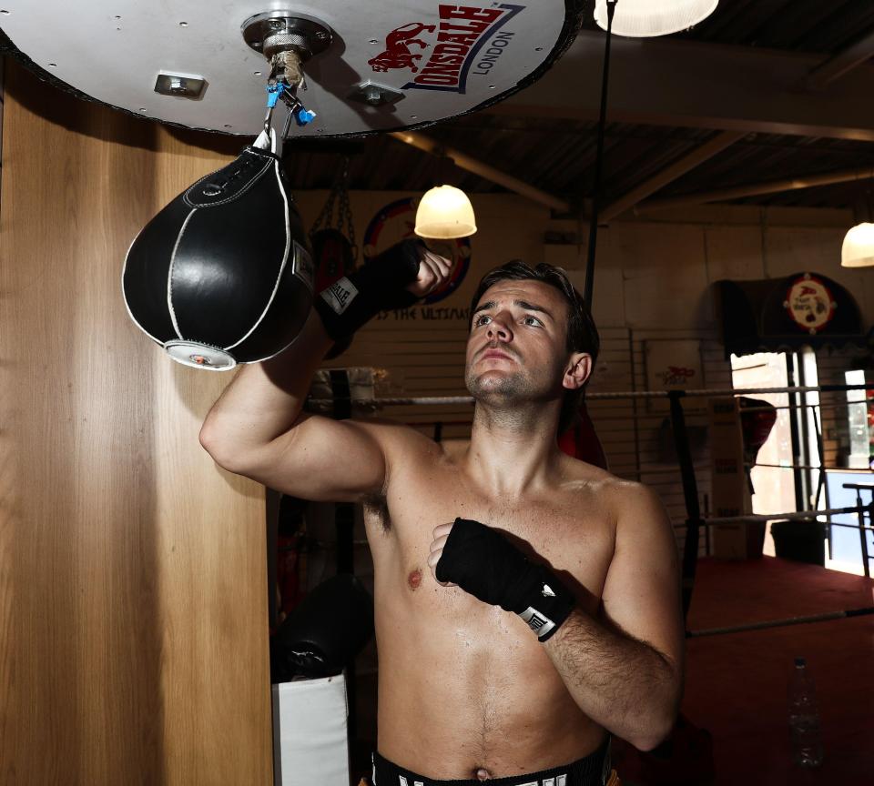 Nathan shows off a muscular physique as he trains for his charity boxing match