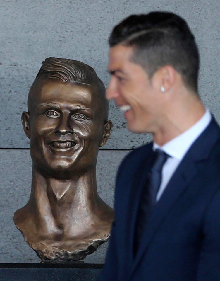  This dodgy bronze of footie ace Cristiano Ronaldo was unveiled at an airport on his native Madeira this week