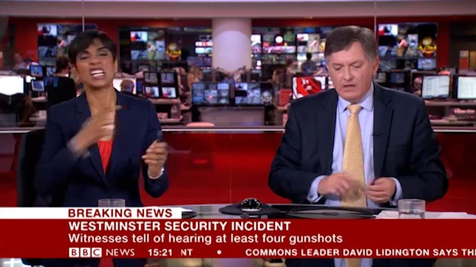  Unfortunate gaffe ... BBC News presenter is caught making 'cut throat' motion on live television