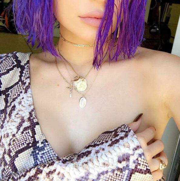  She showed off her new purple locks in posts on Instagram