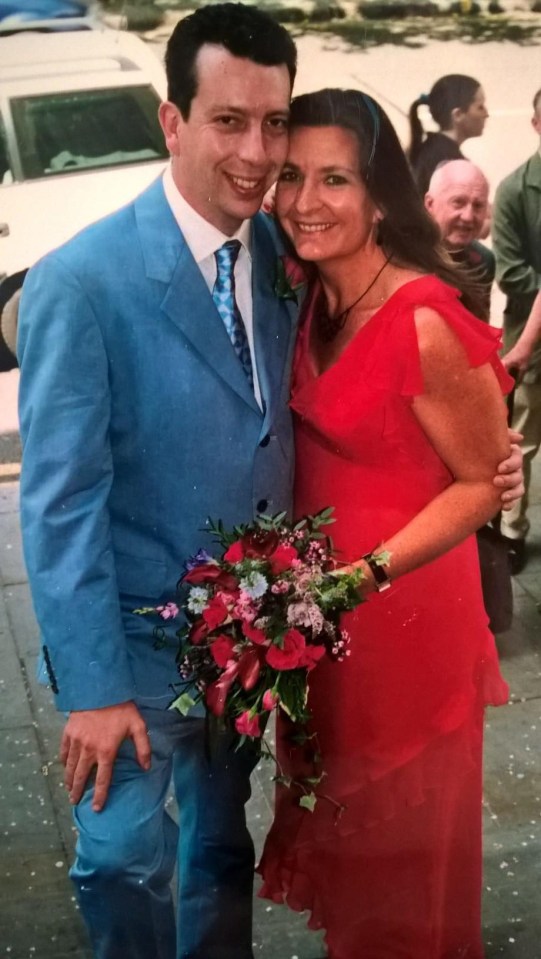 Looking radiant in red on her wedding day