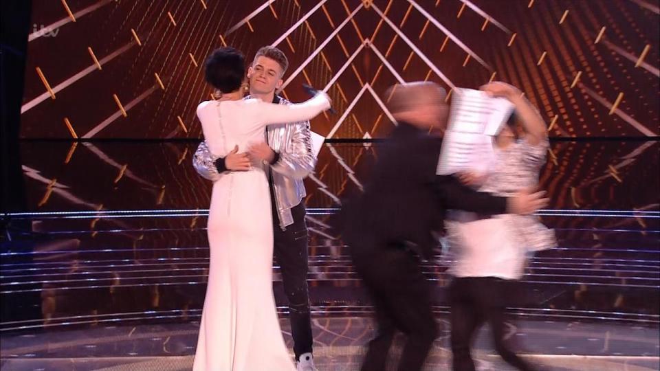  They managed to bundle him off the stage as Emma continued to hold onto Jamie