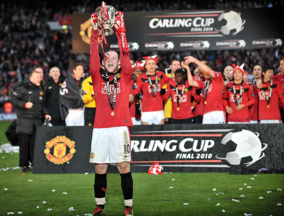 Wayne Rooney celebrates as Manchester United defend League Cup in 2010