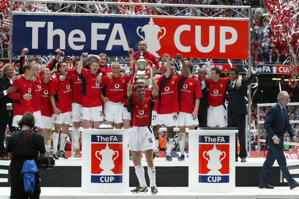 Roy Keane lifts the FA Cup after victory for Manchester United in 2004 final