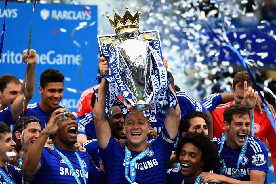 John Terry lifts the Premier League trophy once again Chelsea are 2015 champions