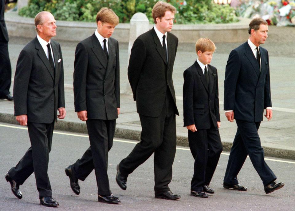  The royal family walking outside Westminster Abbey during the funeral service