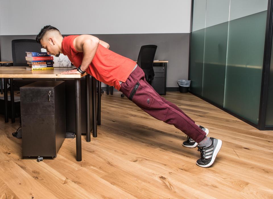  The desk becomes quite handy in this exercise as it provides a base to push off from