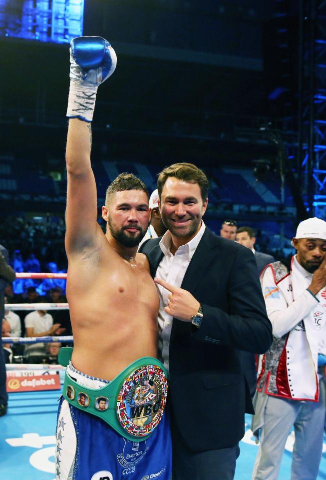  Tony Bellew celebrates after his sensational victory over David Haye at the O2