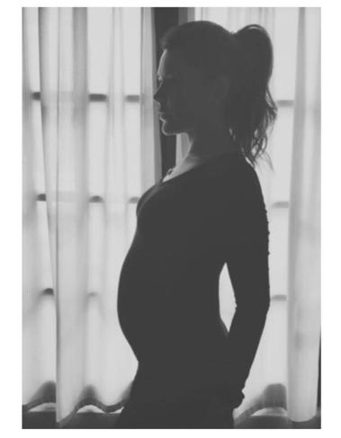  Danielle revealed her baby bump to the world on Mother's Day