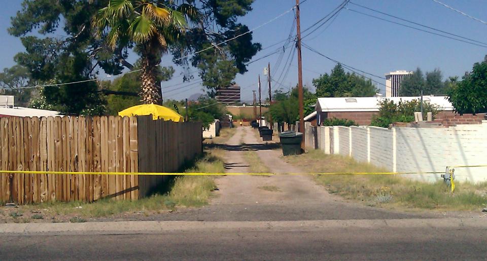  Pictured is an alleyway behind the home from where she vanished in April, 2012