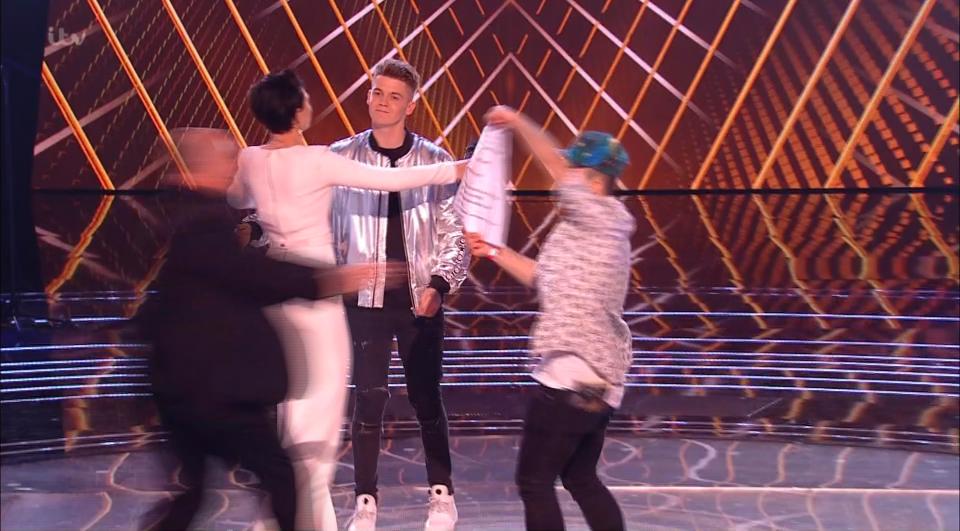  The Voice was sent into meltdown when an unknown man stormed the stage