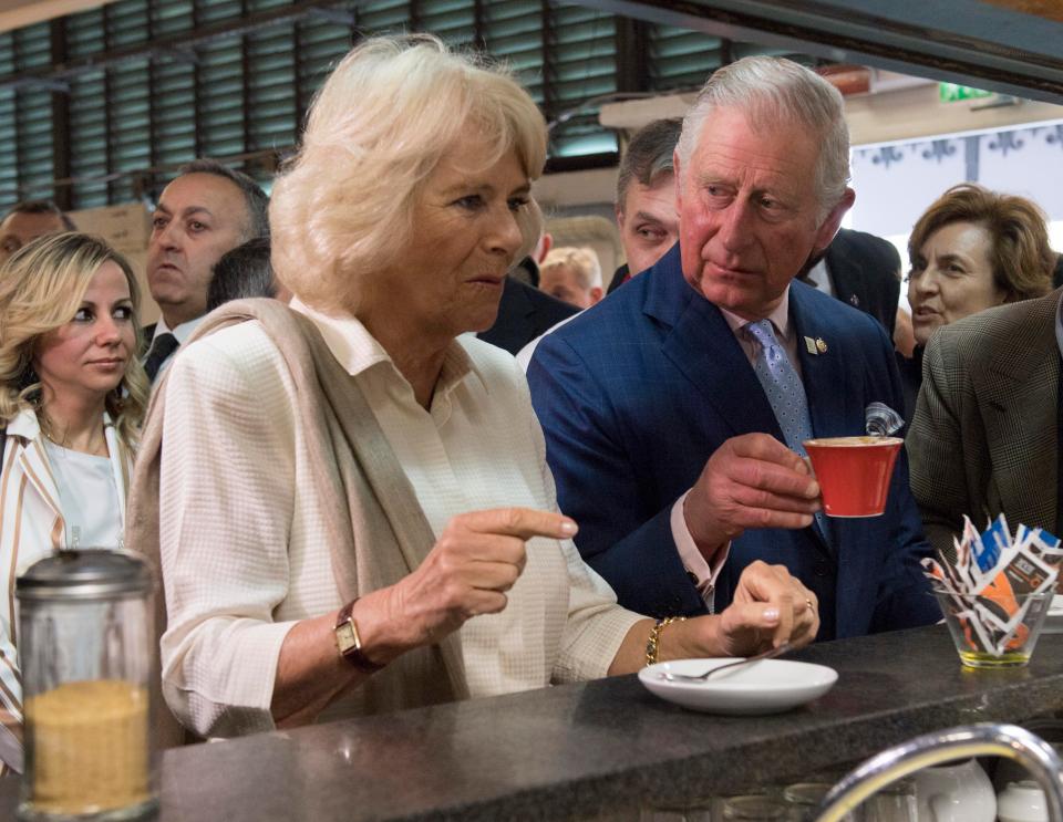  Chivalrous Charles offers her a sip of his hot drink at Florence Cafe Barni