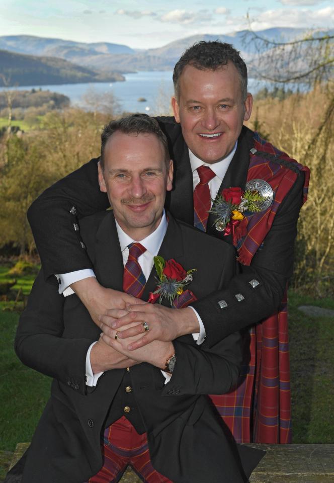  Big day . . . Paul and Graham show off their wedding rings