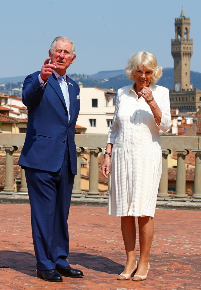  The couple pose at Pitti Palace in downtown Florence during their visit