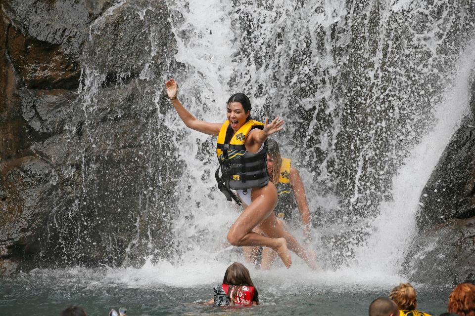  The mum-of-three looked thrilled as she enjoyed a Hawaiian waterfall