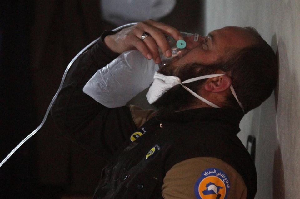  A volunteer rescuer receives oxygen after a suspected gas attack in Syria