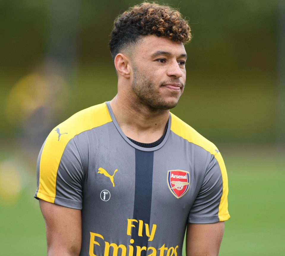 Alex Oxlade-Chamberlain has been urged to stay at Arsenal by his boss Arsene Wenger