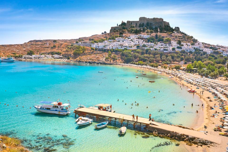  The average price of a family holiday for a week at an all-inclusive family resort in Rhodes (pictured) jumps by £2,965 – or 86 percent between June and August