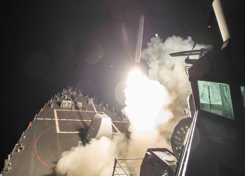  US naval ships launched a devastating 59-missile strike on a Syrian airfield in the early hours of Friday