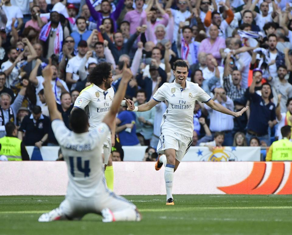  Pepe celebrates scoring the opening goal with a perfect header