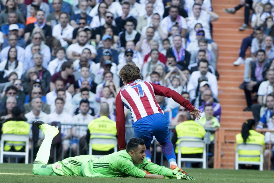  Griezmann turns away after scoring his side's vital equaliser